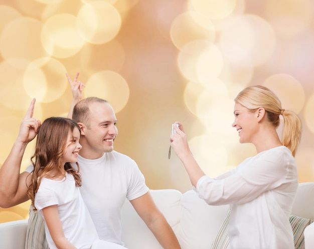 A family happily receiving keys to their new home, symbolizing the peace of mind gained from bundling home and auto insurance policies. The scene is set on a sunny day in front of a suburban house, representing security and financial wisdom.